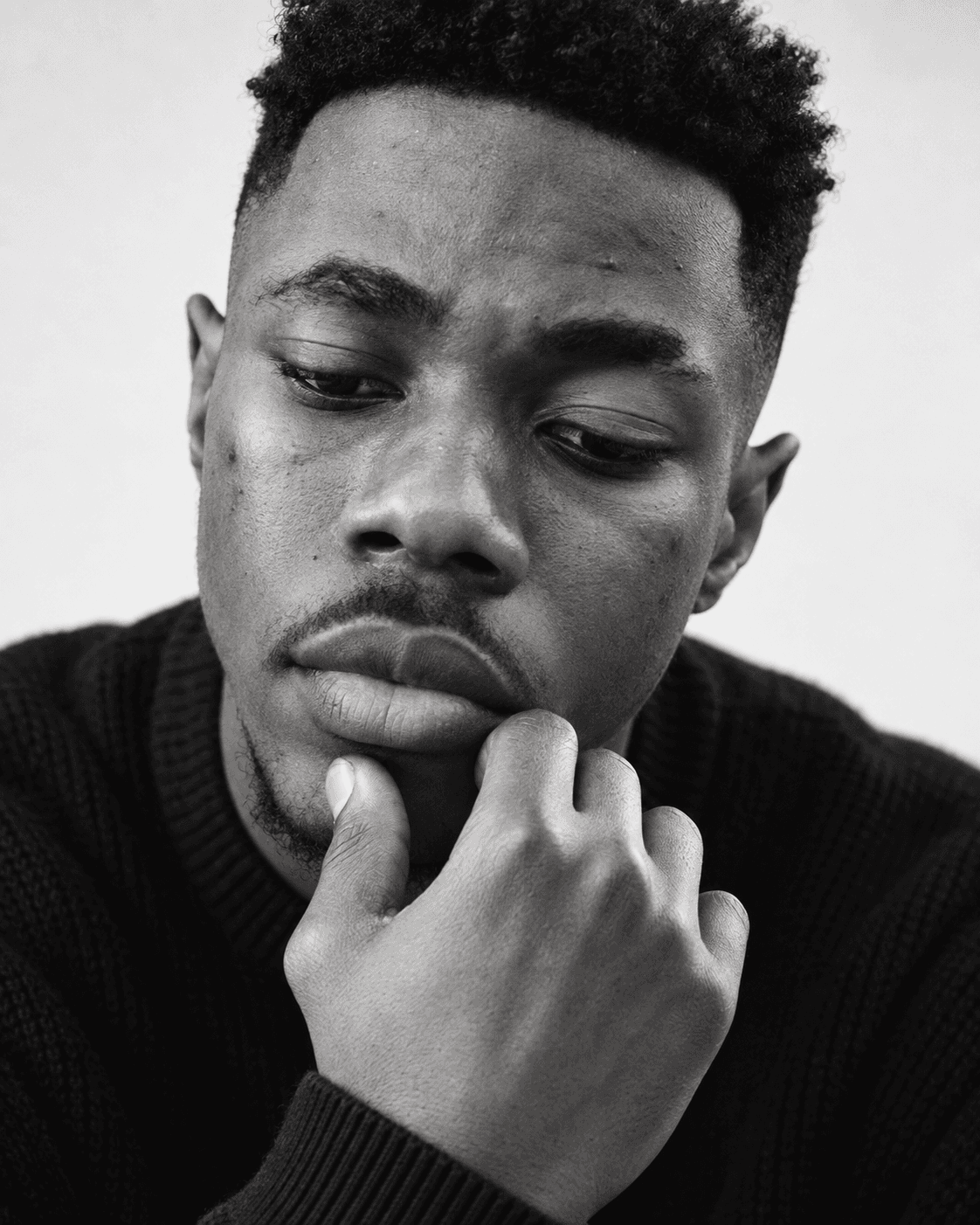 Ese Curtis in a close-up studio portrait